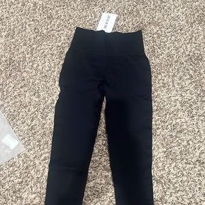 ZYIA black angle grid performance hi-rise 7/8 24” size medium